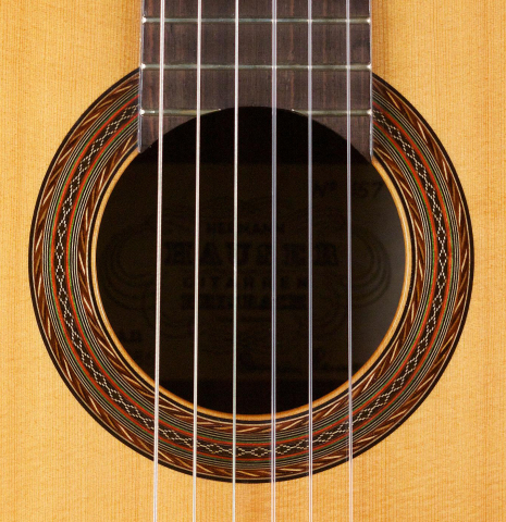 The rosette of a 1986 Hermann Hauser III classical guitar made of spruce and CSA rosewood