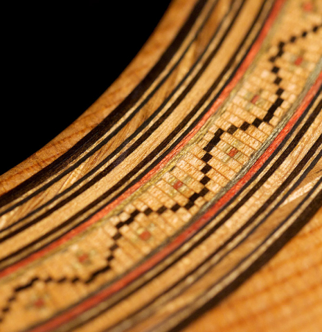 The rosette of a 1992 Hermann Hauser III classical guitar made with spruce top and CSA rosewood back and sides.