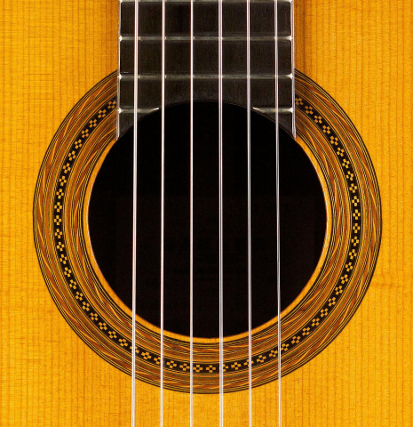 The rosette of a 1956 Hermann Hauser II classical guitar made of spruce and CSA rosewood