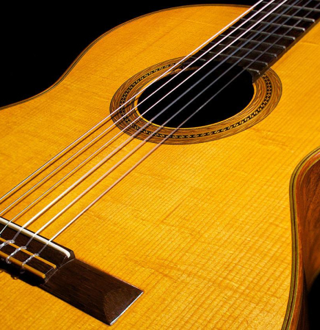 The soundboard of a 1956 Hermann Hauser II classical guitar made of spruce and CSA rosewood