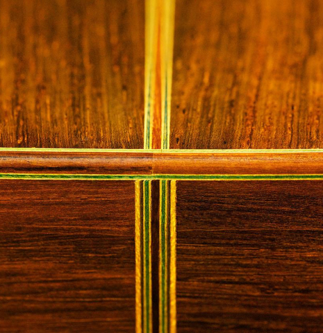 The sides at the foot of a 1956 Hermann Hauser II classical guitar made of spruce and CSA rosewood