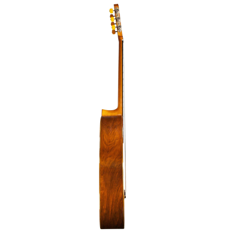 The side of a 1956 Hermann Hauser II classical guitar made of spruce and CSA rosewood