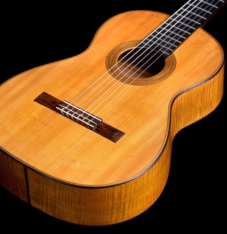 The front of a 1930 Hermann Hauser I &quot;Llobet&quot; classical guitar made of spruce and maple