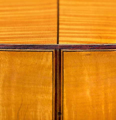 The lower bout of a 1930 Hermann Hauser I "Llobet" classical guitar made of spruce and maple