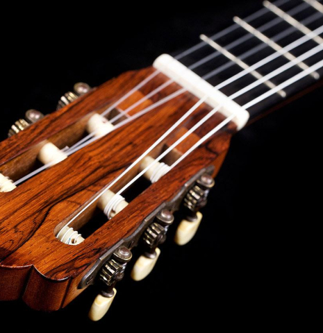 The headstock of a 1930 Hermann Hauser I "Llobet" classical guitar made of spruce and maple