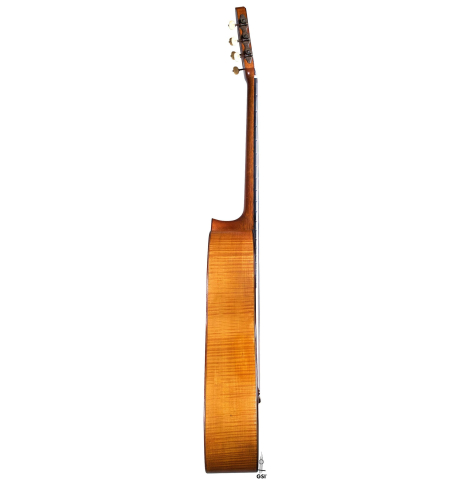 The side of a 1930 Hermann Hauser I "Llobet" classical guitar made of spruce and maple