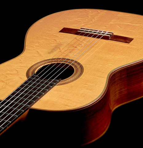 The front of a 1939 Hermann Hauser I classical guitar made with spruce and CSA rosewood.
