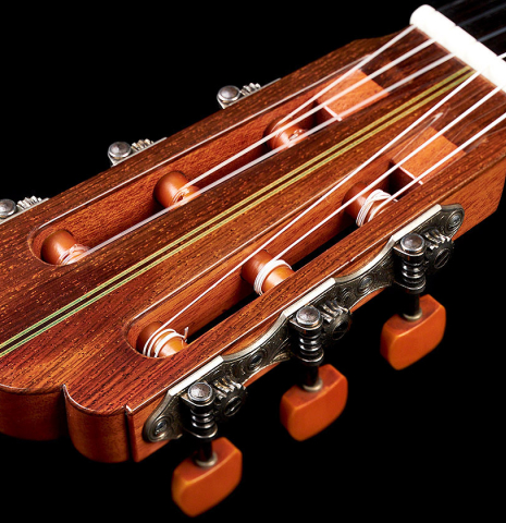 The headstock of a 1960 Hermann Hauser II classical guitar made with spruce and CSA rosewood