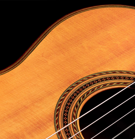 The soundboard of a 1960 Hermann Hauser II classical guitar made with spruce and CSA rosewood
