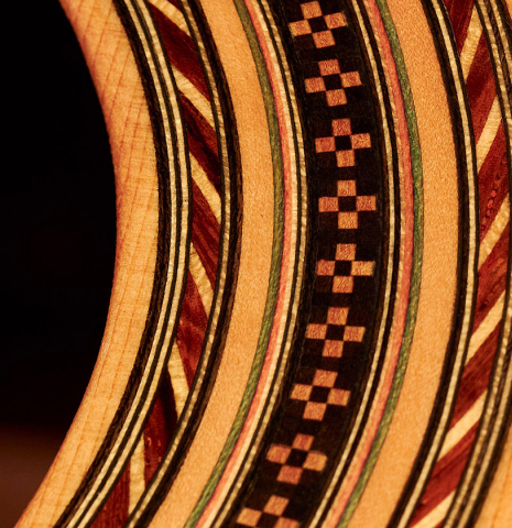 The rosette of a 1960 Hermann Hauser II classical guitar made with spruce and CSA rosewood