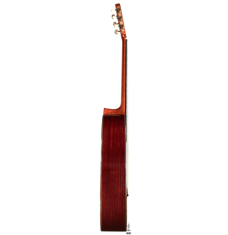 The side of a 1995 Hermann Hauser III classical guitar made with spruce and Indian rosewood