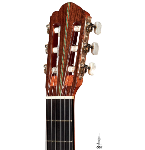 The headstock of a 1995 Hermann Hauser III classical guitar made with spruce and Indian rosewood