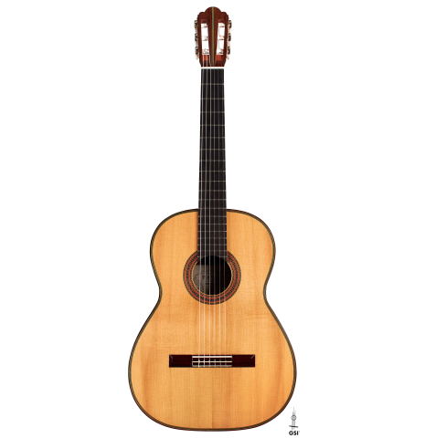 The front of a 1995 Hermann Hauser III classical guitar made with spruce and Indian rosewood