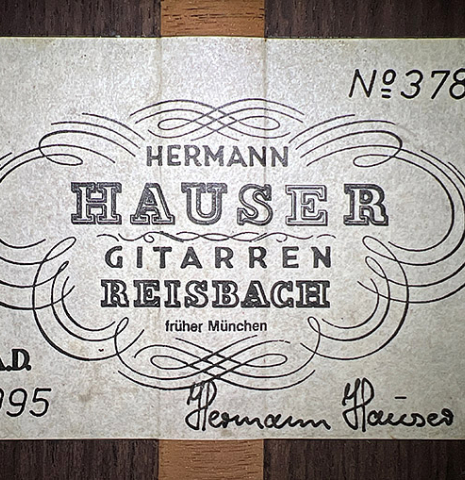 The label of a 1995 Hermann Hauser III classical guitar made with spruce and Indian rosewood