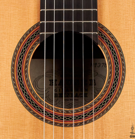 The rosette of a 1995 Hermann Hauser III classical guitar made with spruce and Indian rosewood