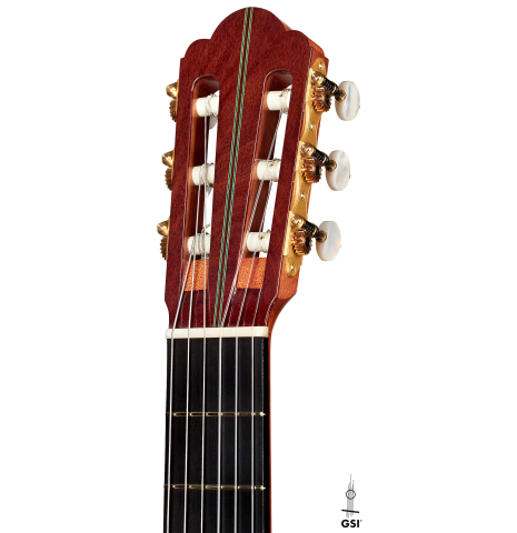 The headstock of a 2022 Kathrin Hauser "Segovia" classical guitar made of spruce and Indian rosewood.