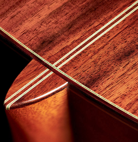 The back and heel of a 2022 Kathrin Hauser "Segovia" classical guitar made of spruce and Indian rosewood.