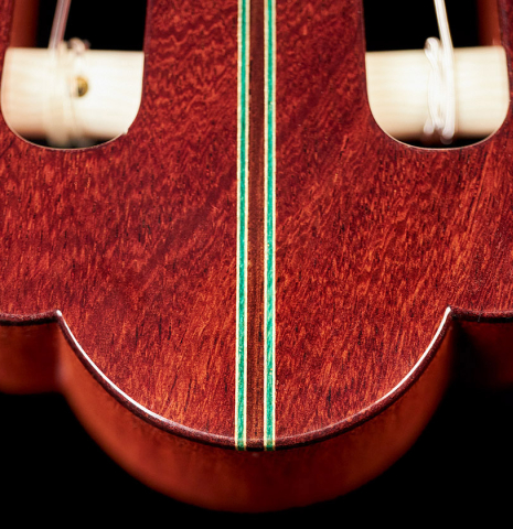 The headstock of a 2022 Kathrin Hauser "Segovia" classical guitar made of spruce and Indian rosewood.