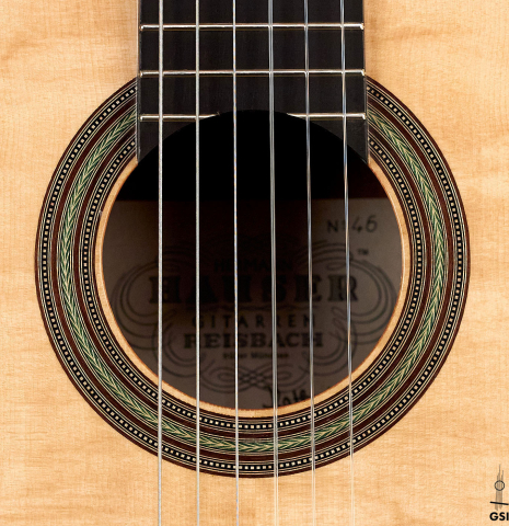 The rosette of a 2022 Kathrin Hauser &quot;Segovia&quot; classical guitar made of spruce and Indian rosewood.