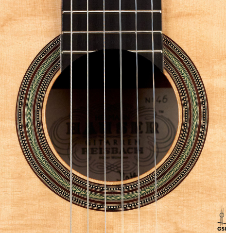 The rosette of a 2022 Kathrin Hauser "Segovia" classical guitar made of spruce and Indian rosewood.