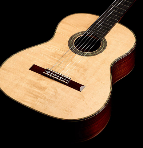 The front of a 2022 Kathrin Hauser "Segovia" classical guitar made of spruce and Indian rosewood.