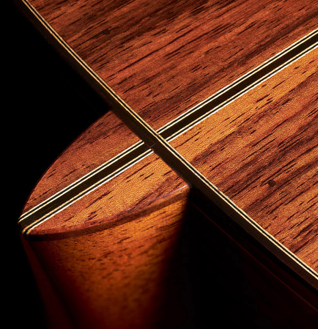 The back and heel of a 2019 Kathrin Hauser "Segovia" classical guitar made of spruce and Indian rosewood.