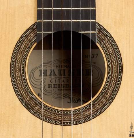 The rosette of a 2019 Kathrin Hauser "Segovia" classical guitar made of spruce and Indian rosewood.