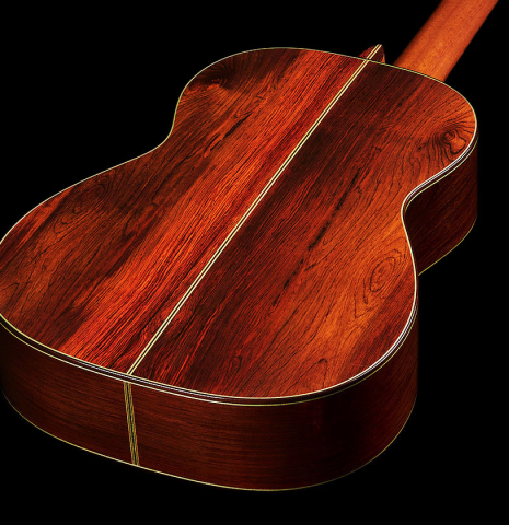 The back and sides at the foot of a 2010 Hermann Hauser III classical guitar made of spruce and CSA rosewood