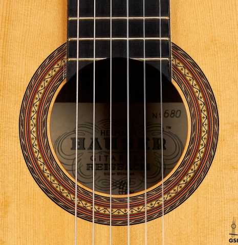 The rosette of a 2010 Hermann Hauser III classical guitar made of spruce and CSA rosewood