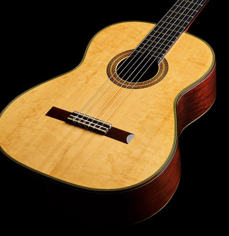 The soundboard of a 2010 Hermann Hauser III classical guitar made of spruce and CSA rosewood