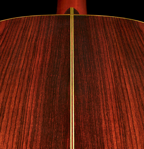 The back center seam of a 1976 Hermann Hauser II classical guitar made of spruce and Indian rosewood