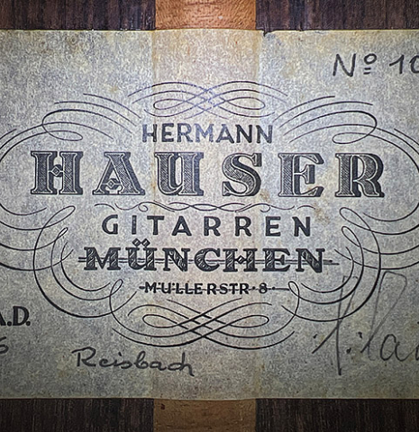 The label of a 1976 Hermann Hauser II classical guitar made of spruce and Indian rosewood