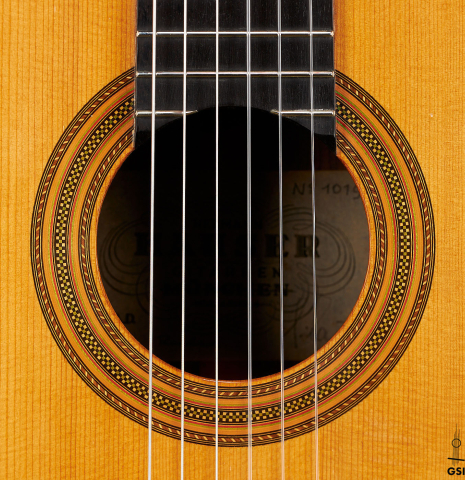 The rosette of a 1976 Hermann Hauser II classical guitar made of spruce and Indian rosewood
