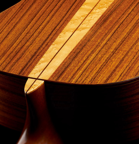 The heel and back bindings of a 2002 Hermann Hauser III classical guitar made of spruce and pau ferro