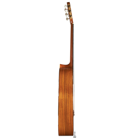 The side of a 2002 Hermann Hauser III classical guitar made of spruce and pau ferro