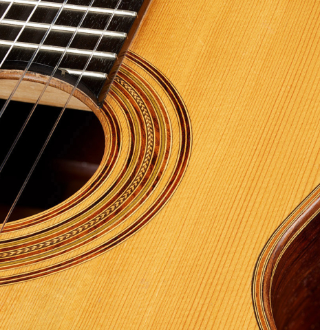 Detailed closeup of the rosette of a 1934 Hermann Hauser I classical guitar made of spruce and CSA rosewood