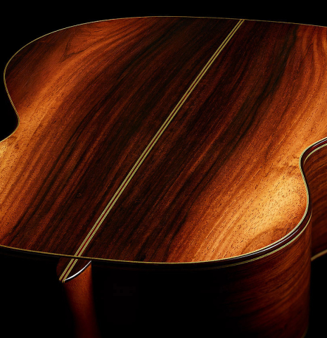 The heel, back binding and purfling of a 2000 Hermann Hauser III classical guitar made of spruce and CSA rosewood