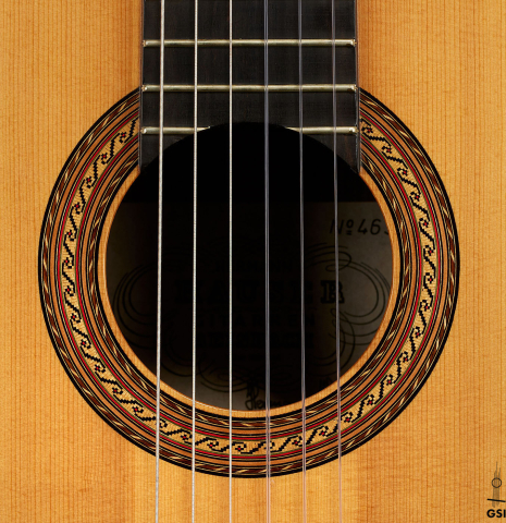 The rosette of a 2000 Hermann Hauser III classical guitar made of spruce and CSA rosewood