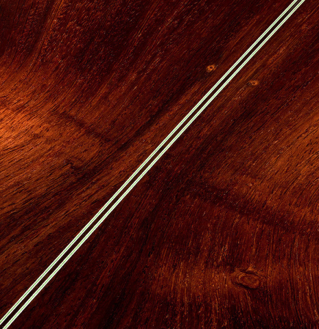 The back center seam of a 2022 Kathrin Hauser "Segovia" classical guitar made of spruce and CSA rosewood