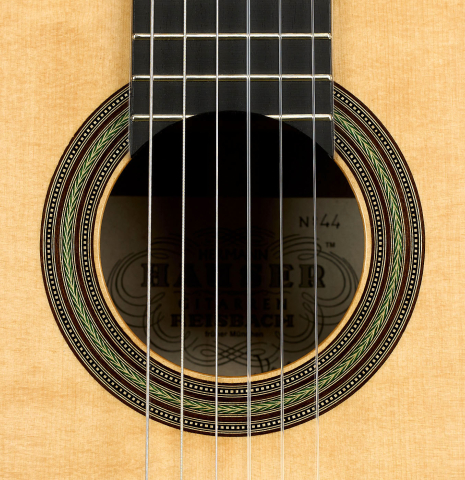 The rosette of a 2022 Kathrin Hauser "Segovia" classical guitar made of spruce and CSA rosewood