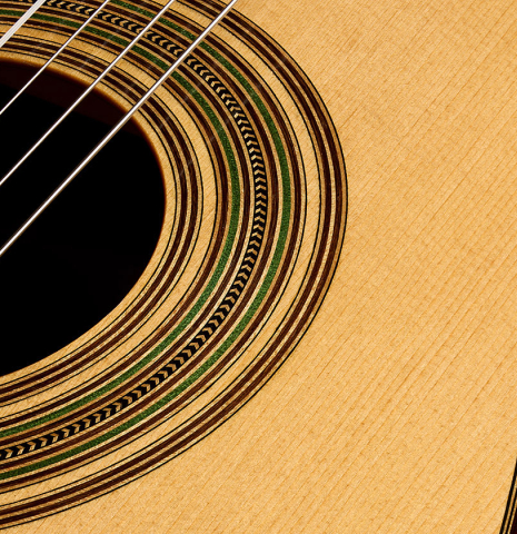 The top and rosette detail of a 2004 Hermann Hauser III "1931 Segovia" classical guitar (ex Marcelo Kayath) made of spruce and CSA rosewood