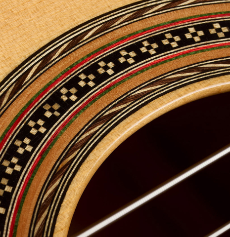 Detailed close-up of the rosette of a 2016 Hermann Hauser III classical guitar (ex Marcelo Kayath) made of spruce and maple