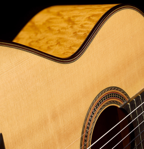 The soundboard and side of a 2016 Hermann Hauser III classical guitar (ex Marcelo Kayath) made of spruce and maple