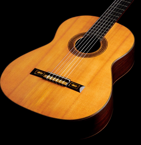The front of a 1930 Santos Hernandez Spanish vintage classical guitar made with spruce top and CSA rosewood. 