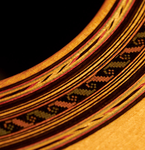 The rosette of a 1930 Santos Hernandez Spanish vintage classical guitar made with spruce top and CSA rosewood. 