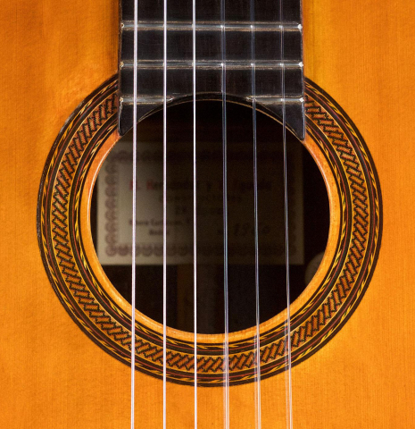 The rosette of a 1960 Hernandez y Aguado classical guitar made of spruce and CSA rosewood