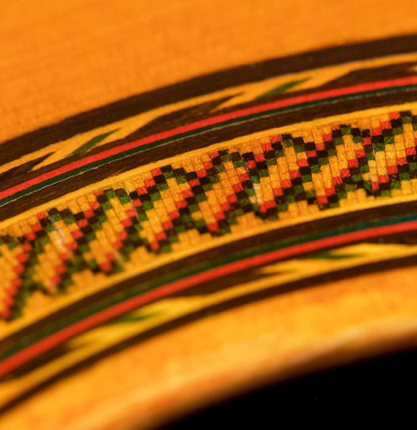 Close-up detail of the rosette of a 1960 Hernandez y Aguado classical guitar made of spruce and CSA rosewood
