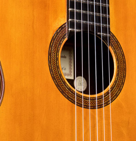 The soundboard of a 1960 Hernandez y Aguado classical guitar made of spruce and CSA rosewood