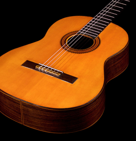 The soundboard of a 1965 Hernandez y Aguado classical guitar made with spruce and Indian rosewood