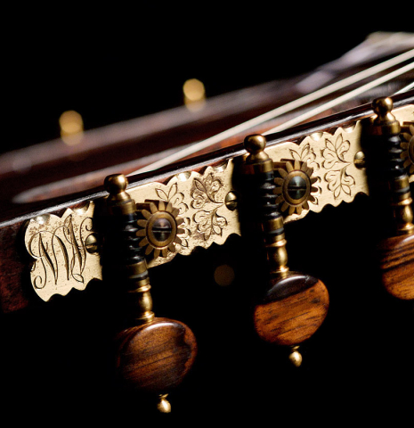 Machine heads of a 1965 Hernandez y Aguado classical guitar made with spruce and Indian rosewood